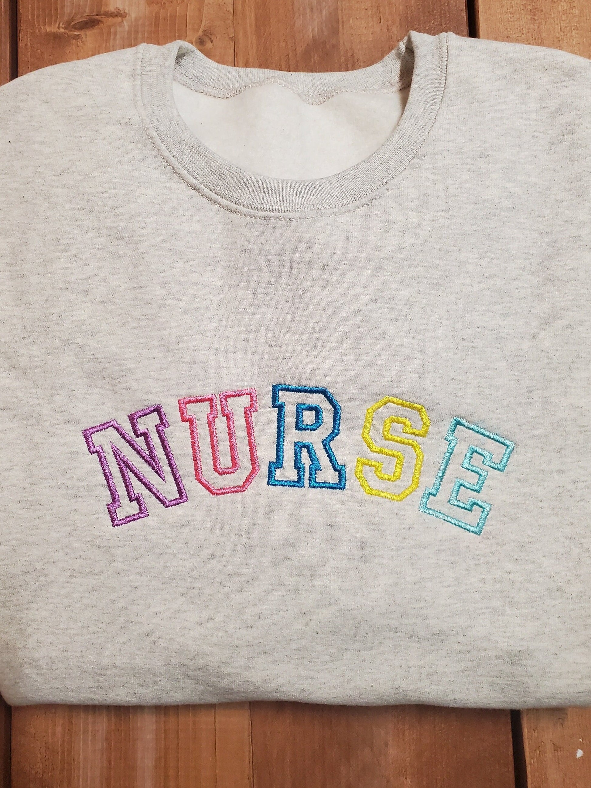 Nurse Shirt, New Nurse Shirt, Nurse Sweatshirt, RN, LPN, CNA,Nursing School Gift, New Nurse Graduate Gift, Nurse Appreciation Gift, Nursing Home shirt, Nurse Floor Uniform, Trending Gift, Best Seller, Etsy Pick